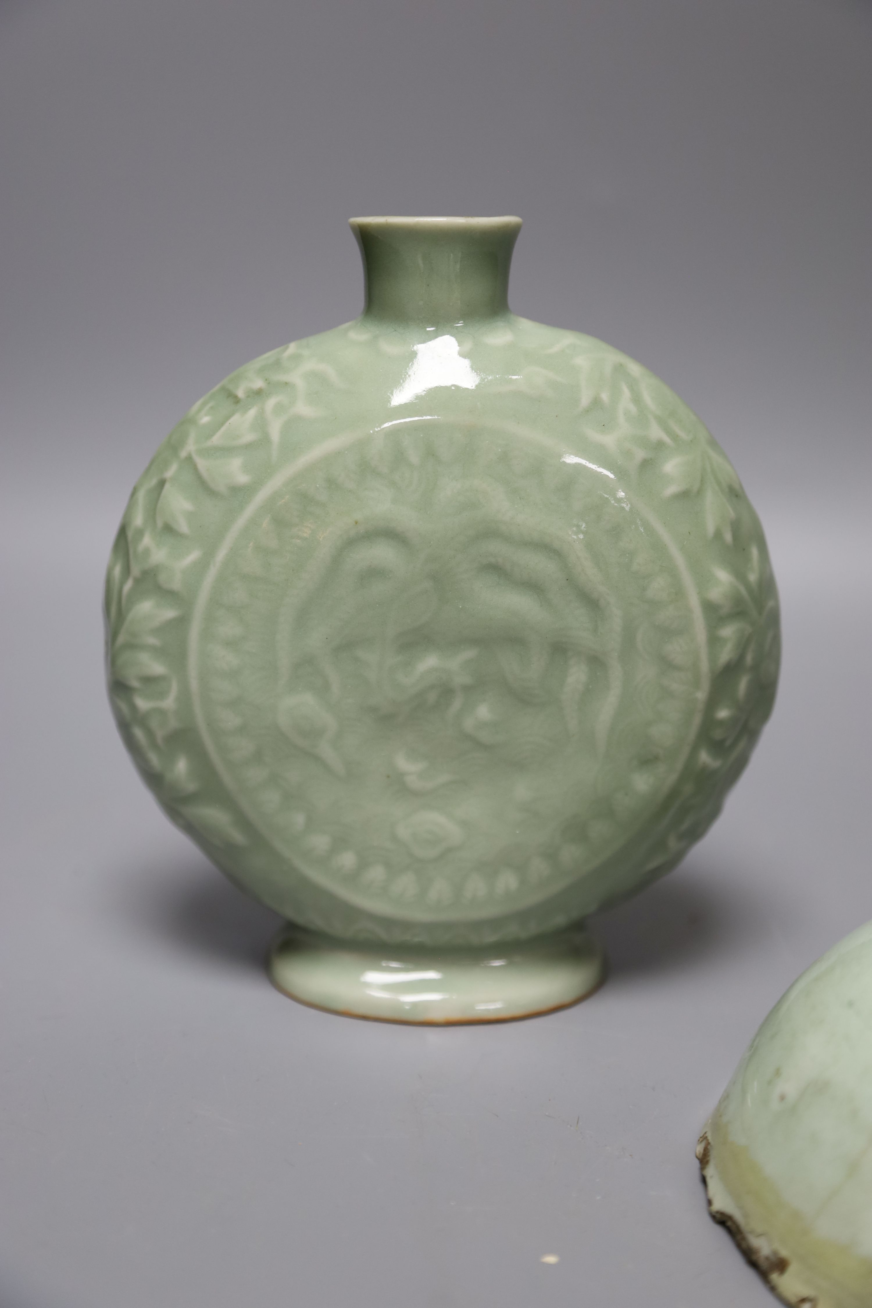 A Chinese celadon glazed moonflask, height 17cm, and bowl